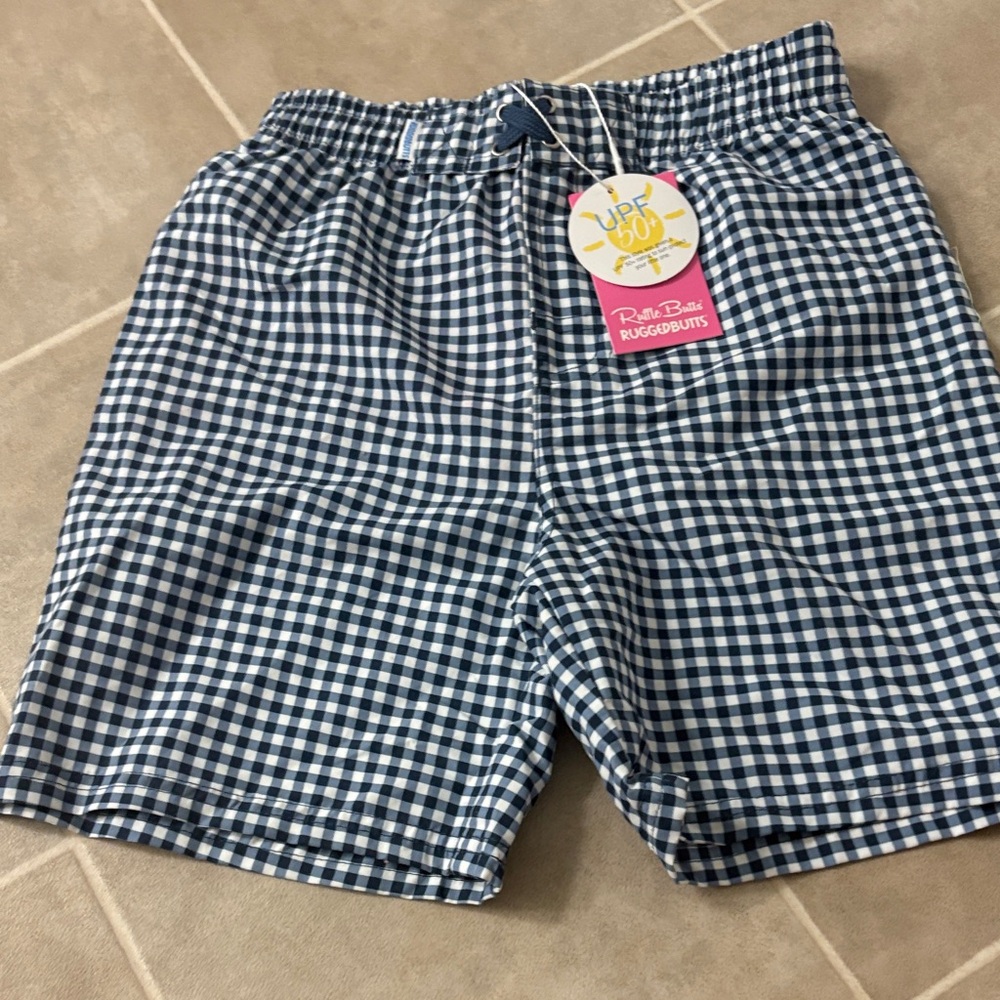 RuffleButts Kids Navy Checkered Swim Trunks